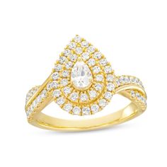 a yellow gold ring with diamonds on the band and a pear shaped diamond in the center