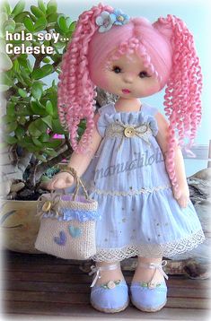 a doll with pink hair holding a basket