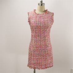 Discover the charm of our Women's Custom-Made Round Neck Tweed Sheath Dress in Pink. This versatile dress is perfect for various occasions, including wedding Guest , birthday parties, or as a thoughtful and personal gift. ✨ Dress Features: Round neck design for a classic and timeless look. Available in sleeveless, short sleeves, or long sleeves options for your preference. Beautifully crafted sheath silhouette for a flattering fit. Custom-made to your measurements for the perfect look and feel. Tweed And Tulle Dress, Luxury A-line Tweed Dress For Formal Events, Luxury Sequined Tweed Dress, Luxury Fitted Tweed Dress For Semi-formal Events, Luxury Formal Tweed Dress For Fall, Luxury Evening Mini Length Tweed Dress, Luxury Wool Tweed Dress For Formal Occasions, Chanel Tweed Dress 2021, Elegant Pink Sleeveless Tweed Dress