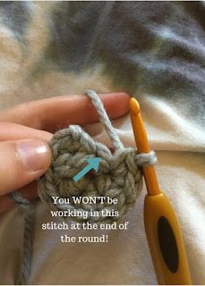 someone is crocheting the end of a piece of yarn