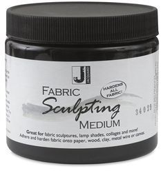 the jar of fabric sculpting medium is black and has white writing on it