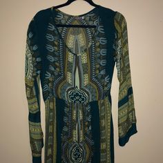 60” From Shoulder Casual Long Sleeve Maxi Dress For Festivals, Hippie Long Sleeve Patterned Dress, Bohemian Fitted Mini Dress With Long Sleeves, Bohemian Fitted Long Sleeve Mini Dress, Fitted Bohemian Long Sleeve Mini Dress, Fitted Long Sleeve Bohemian Mini Dress, Fitted Boho Dress For Fall Vacation, Green Boho Print Flowy Midi Dress, Green Rayon Long Sleeve Maxi Dress