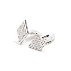 Cufflinks have always been a major part of every black tie dress code. These tiny baubles aren’t just functional but also can make an entire outfit look more put-together and give it an extra dose of sophistication. If you’re looking for cufflinks that exude extra luxeness and modernity, check out our well-crafted and dynamic white diamond cufflinks at VIYA. At VIYA, we know the importance of styling an ensemble with carefully curated pieces that can elevate the entire look. This is why our whit Luxury Formal Earrings With Single Cut Diamonds, Formal Diamond Clip-on Jewelry, Designer Formal Jewelry With Single Cut Diamonds, Formal White Gold Earrings, Formal White Gold Sterling Silver Cufflinks, White Gold Sterling Silver Cufflinks For Business, Classic Cuff Jewelry For Party, Designer White Gold Cufflinks For Formal Occasions, Elegant White Gold Cufflinks For Anniversary