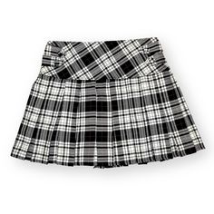 Description: The Classic Tartan Pattern Adds A Touch Of Sophistication, While The Pleated Design Creates A Timeless And Flattering Silhouette. Perfect For Both Casual And Dressy Occasions, This Skirt Is A Versatile Wardrobe Staple. Condition: Excellent/ Brand New With Tags!!! Color: Black And White Details: Has No Pockets, Has Zipper Closure In The Back Material: 65% Polyester, 35% Viscose Size: 6 Measurements Length: 14 ½ Inches Waist: 16 Inches *Measurements Are Approximate* *Measurements Are Clueless Skirt, Scottish Skirt, Black And White Plaid Skirt, Plaid Tennis Skirt, Tartan Pleated Skirt, Latex Mini Skirt, White Plaid Skirt, Black Plaid Skirt, Plaid Pleated Mini Skirt