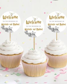 three cupcakes with white frosting and welcome signs on top, surrounded by confetti