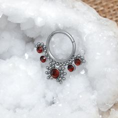 This is a very beautiful Surgical Steel septum clicker ring with Garnet stones. This gorgeous piece of jewelry is perfect for a variety of outfits and occasions. The listing is for ONE clicker ring. This item does not contain nickel. --- C u s t o m i z i n g --- The septum ring can be made with the following gemstones: Garnet, Blue Opal, White Opal, Turquoise, Red Ruby, Lapis, Red CZ, Green CZ, Blue CZ, Pink CZ, Clear CZ. Please select one during checkout process. Your septum ring can be made i Gift Metal Septum Ring Internally Threaded, Stacked Septum, Septum Earrings, Hoop Septum, Daith Earring, Daith Jewelry, Septum Nose Rings, Tragus Jewelry, Septum Nose