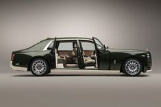 a rolls royce limousine with its doors open