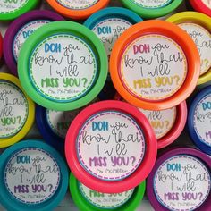 many colorful frisbees with words on them that say do you know what they are?