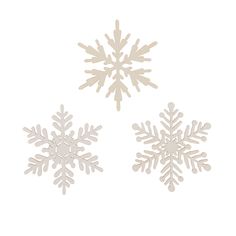 three snowflakes are shown in white on a white background and one is made out of paper