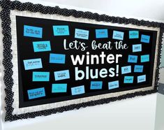 a bulletin board with post - it notes attached to it and the words let's beat the winter blues