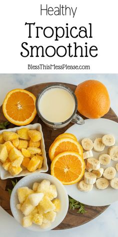 healthy tropical smoothie recipe with oranges, bananas and other fruits on a plate