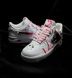 The White Voorhee Air Force 1 is a unique, one-of-a-kind sneaker, featuring a white base and signature Air Force 1 silhouette and machete mask panel. The sneaker is styled with Shoe Baker's signature &  red drip, plus a horror-themed twist that makes it impossible to look away, This sneaker is sure to make a statement. Base shoe will be ordered from Nike.com or similar venders that carry the authentic Nike Air force 1. Turnaround time typically take 2-4 weeks from the initial date of purchase. Custom Low-top Sneakers With Red Sole, Custom White Sneakers With Rubber Sole, Custom White Leather Sneakers, Custom White Lace-up Sneakers, White Waterproof Custom Lace-up Sneakers, Custom Sneakers With Rubber Sole For Streetwear, Custom Sneakers For Streetwear With Rubber Sole, Custom Streetwear Sneakers With Rubber Sole, Custom High-top White Sneakers With Waterproof Paint