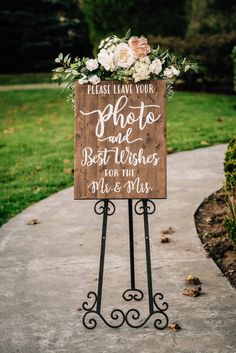 a wooden sign that says, please leave your photo and best wishes for the bride