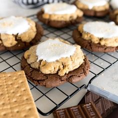 cookies with marshmallows and graham crackers on a cooling rack