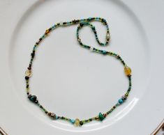 citrine turquoise seed bead artisan necklace 17.5 inches Long Single Strand Crystal Necklace For Jewelry Making, Spiritual Single Strand Long Necklace, Dainty Amber Round Jewelry, Artisan Green Jewelry For Festival, Dainty Round Amber Jewelry, Bohemian Single Strand Jewelry, Artisan Jewelry With Colorful Adjustable Beads, Turquoise Beaded Dangle Jewelry, Artisan Adjustable Colorful Beaded Jewelry