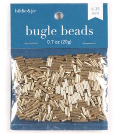 a package of wooden bead caps for sewing and crafting, with gold colored wood beads