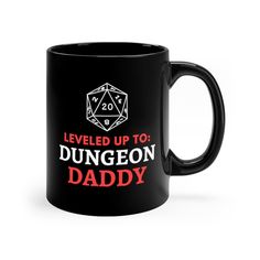 a black coffee mug with the words level up to dungeon daddy on it