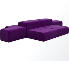 three purple couches sitting next to each other on a white surface with no one in it