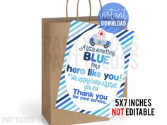 a blue paper bag with the words, thank you and an image of a car on it