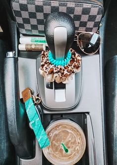 the contents of a car seat are neatly organized and ready to be used as a drink dispenser