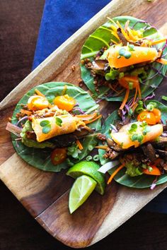 some food is laying out on a wooden board and ready to be eaten by someone