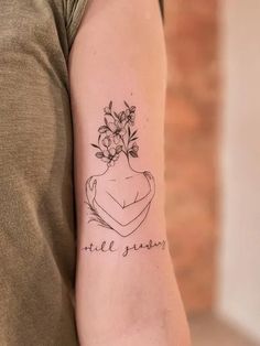 a woman's arm with a tattoo on it that reads, little sunshine and flowers