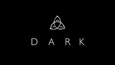 the dark logo is shown on a black background with white letters and an image of a triangle