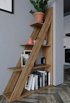 a wooden shelf with books and plants on it