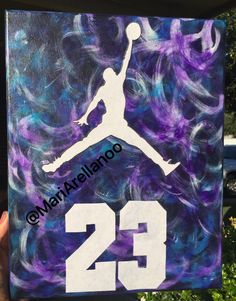 a painting of a basketball player with the number twenty five painted on it