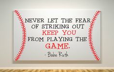 a baseball with the words never let the fear of striking out keep you from playing the game