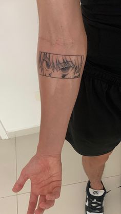 a person with a tattoo on their arm