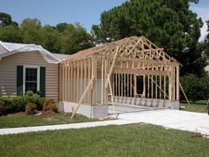 a house being built in the middle of a yard