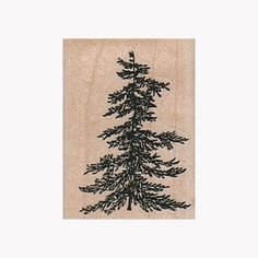 a rubber stamp with a pine tree on it