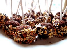 chocolate covered desserts with white and brown sprinkles