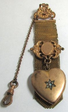 (eBay) Find many great new & used options and get the best deals for VINTAGE GOLD FILLED OPAL HEART LOCKET CLIP VEST POCKET WATCH CHAIN FOB at the best online prices at eBay! Free shipping for many products! Vintage Jewelry Antique Gold, Historical Accessories, Antique Locket, Vintage Display, Pocket Watch Chain, Victorian House, Unusual Jewelry, Funky Jewelry, Pinterest Outfits