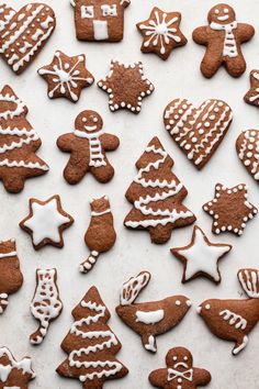 many different types of ginger cookies on a table