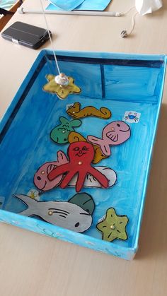 a blue tray with an octopus and starfish design on it