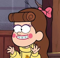 a cartoon character with big eyes and brown hair, wearing a yellow shirt that has a pink bow on it's head