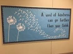 a blue and white sign that says a seed of kindness can go farther than you think