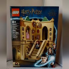 a lego harry potter's hogwarts castle set in its box