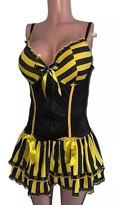 a female mannequin wearing a black and yellow striped corset