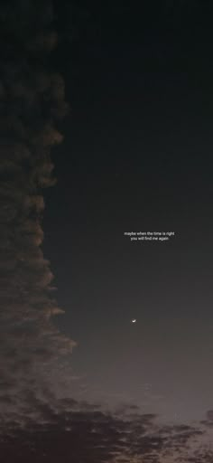 an airplane flying in the sky at night with a quote on it's side