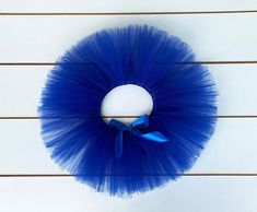 This gorgeous handmade royal blue tutu has an adjustable tie so it will fit most children aged from 6 months through to 3 years of age. More than 30 meters of tulle was used to create this tutu. It will be ideal to wear to a birthday party, a photo shoot or even a wedding. I can custom make tutus in other sizes and colours so please contact me if you have any questions. This order will be posted from Brisbane, Australia. Blue Tutu, Baby Girl Toddler, The Wiggles, Wedding Blue, Girl Toddler, Party Skirt, Brisbane Australia, Birthday Photo