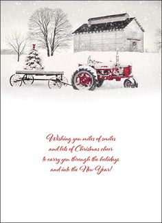 a christmas card with an old fashioned tractor in front of a barn and snow covered field