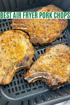 three pieces of meat sitting on top of a black grill grates in a pan