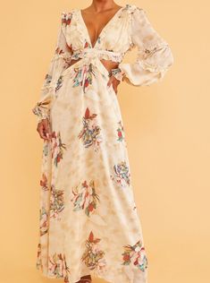 Turn heads in this gorgeous cut out floral print maxi. -Cut out side -Deep plunging neckline. -Sheer long sleeves and a lace up back closure. -Balloon sleeves with elastic cuffs -Polyester Long Sleeve Floral Maxi Dress, Long Dress Casual, Floral Print Maxi, Sleeve Maxi Dress, Long Sleeve Floral Dress, Maxi Gowns, Long Sleeve Maxi, Style Maxi Dress, Long Dresses