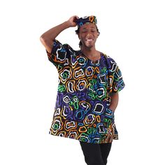 The Bold Ankara Print Dashiki is a dynamic and eye-catching piece that adds style to your clothing collection. It features a small V-neckline, short angel sleeves for a breezy feel, and two pockets for convenience. Available in a variety of patterns, including Style A with Kente patchwork, Style B with chevron lattice patterns, Style C with a colorful mix of shapes, Style D with lime green circles and spirals on pink, and Style E with an eclectic mix of geometric patterns. Each style comes with Casual Multicolor Short Sleeve Tunic, Casual Multicolor Short Sleeve Kaftan, Blue Casual Short Sleeve Kaftan, Multicolor Short Sleeve Tunic For Vacation, Printed Long Skirt, African Dashiki, Angel Sleeves, Ankara Print, African Mud Cloth