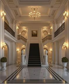 an elegant staircase with chandelier and marble flooring in a large white building