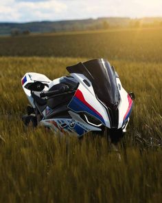 a motorcycle that is sitting in the grass