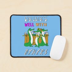 a mouse pad with an image of two crocodiles on it and the words drinks well with others